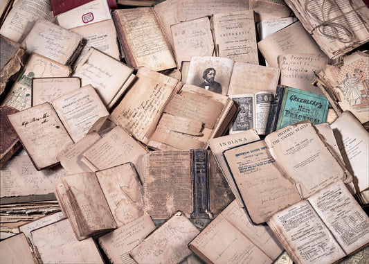 A detailed collage print of overlapping antique open books, revealing 19th-century handwriting, sketches, and weathered paper textures.